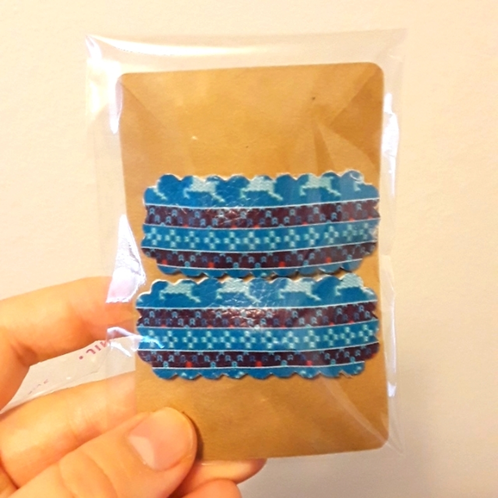 Blue holiday print hair clips